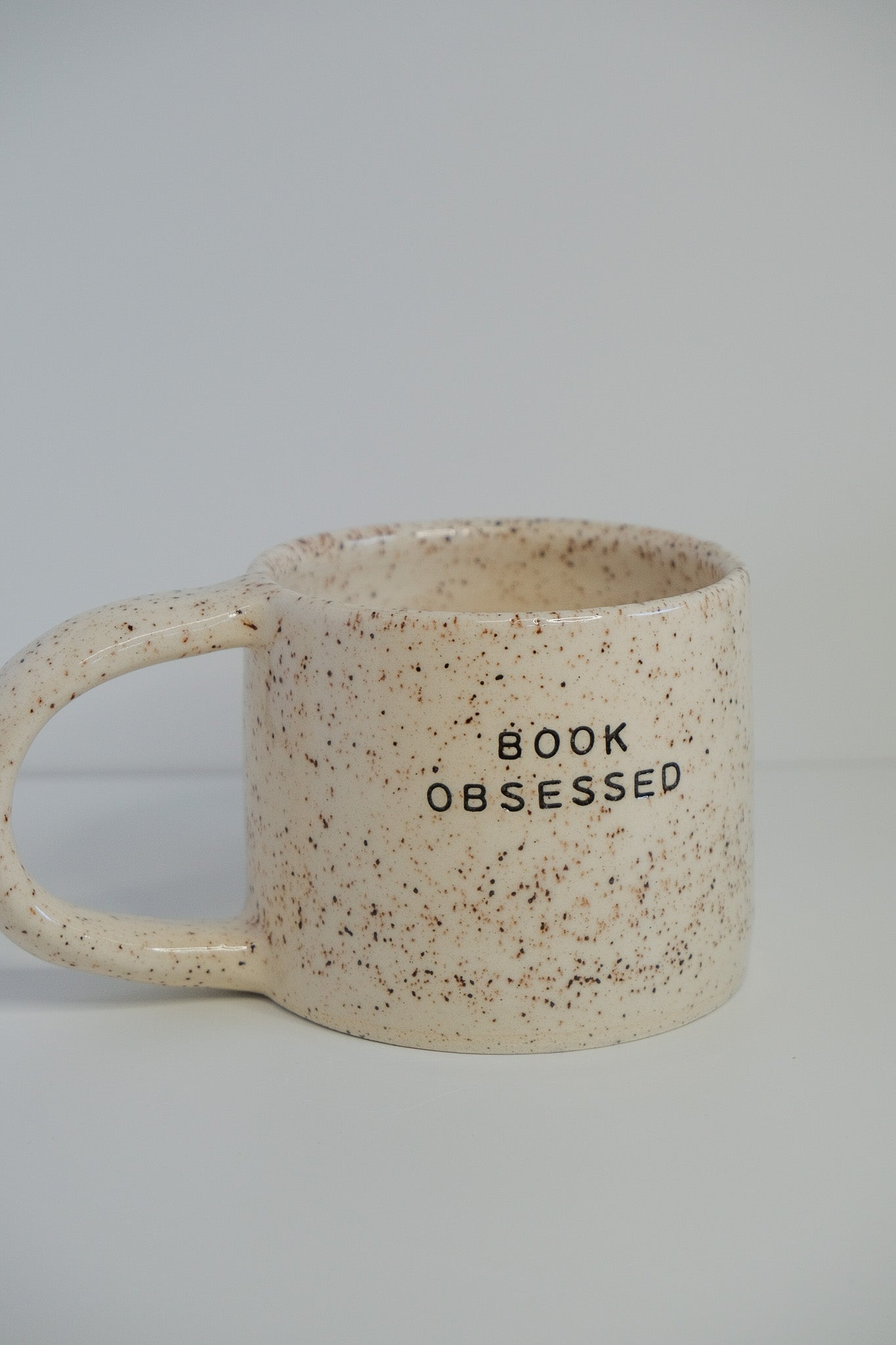 'book obsessed' mini mug